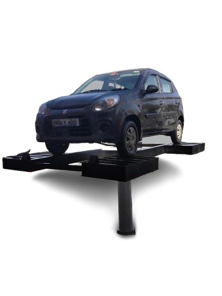 Vehicle raised on hydraulic washing lift for underbody access